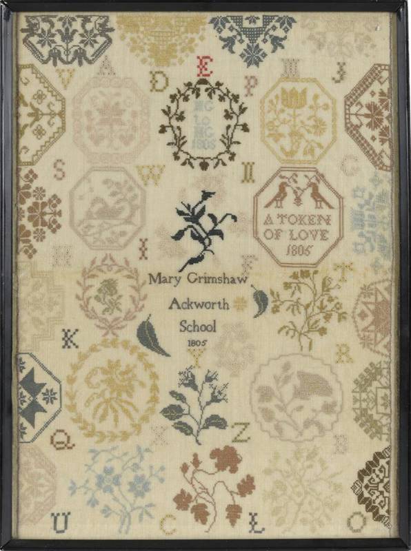 Lot 1231 - A Framed Ackworth School Medallion Sampler