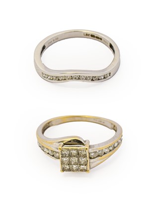 Lot 1050 - An 18 carat white gold diamond cluster ring,...