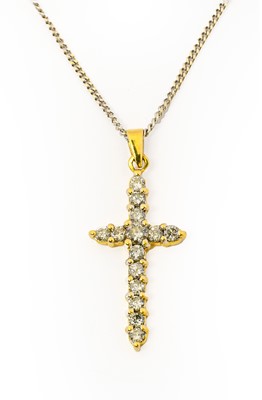 Lot 1105 - A diamond cross pendant on chain, the cross...