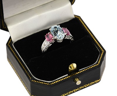 Lot 1067 - An aquamarine, pink sapphire and diamond ring,...