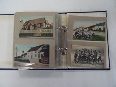 Lot 366 - A blue album containing approx. 100 postcards...