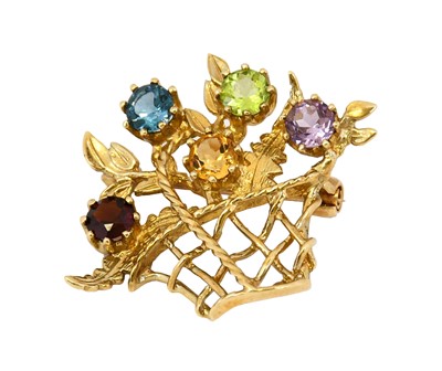 Lot 1061 - A 9 carat gold multi-gem set brooch, of...