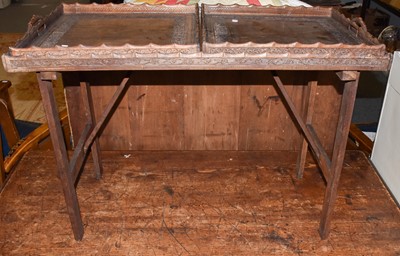 Lot 1233 - An Anglo-Indian Carved Hardwood Folding Table,...