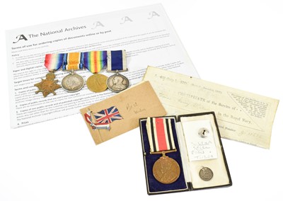 Lot 12 - A First World War Naval Long Service Group of...