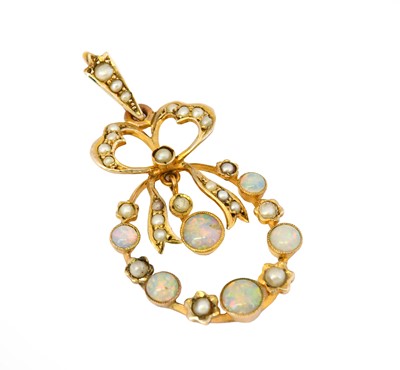 Lot 1103 - An Edwardian opal and split pearl pendant, the...