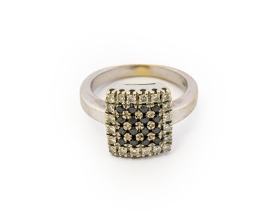 Lot 1110 - A black diamond and diamond cluster ring, the...