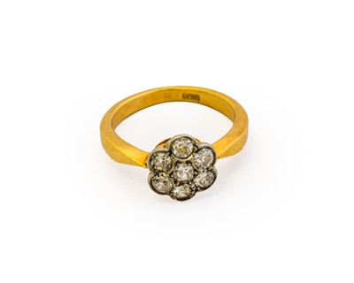 Lot 1090 - A diamond cluster ring, the cluster formed of...