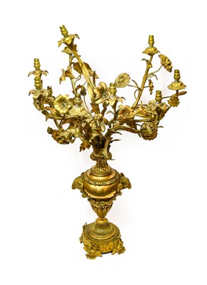 Lot 1053 - A Gilt Metal Nine-Light Candelabrum, in Louis...