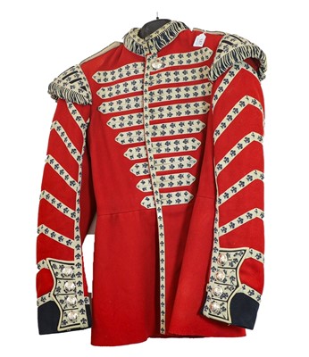 Lot 187 - An Elizabeth II Scarlet Tunic, to a Bandsman...