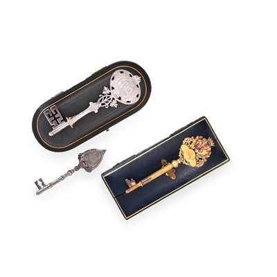 Lot 2074 - Three Victorian, Edward VII or George V Silver or Silver-Gilt Presentation-Keys