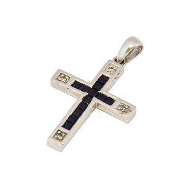 Lot 1071 - A 9 carat white gold sapphire and diamond...