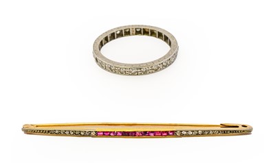 Lot 1001 - A diamond eternity ring, the round eight-cut...