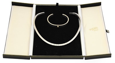 Lot 1024 - A silver torque, the plain polished torque...