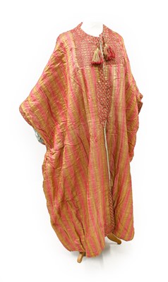 Lot 2187 - Late 19th Century Eastern Robe, of pink and...