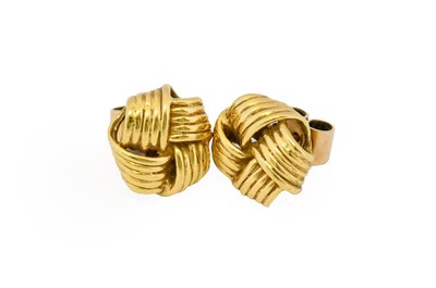 Lot 1049 - A pair of 18 carat gold earrings, formed of...