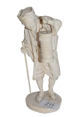 Lot 211 - An early 20th century Japenese ivory okimono...