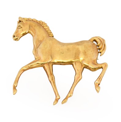 Lot 1040 - A 9 carat gold horse brooch, the yellow plain...