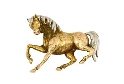 Lot 1055 - A horse brooch, the horse realistically...