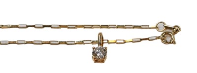 Lot 1019 - A diamond solitaire pendant on chain, the...