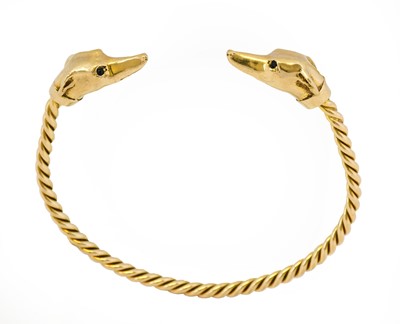 Lot 1045 - A 9 carat gold torque bangle, by Harriet Glen,...
