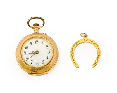 Lot 1052 - An openfaced fob watch, outer case marked 14K,...