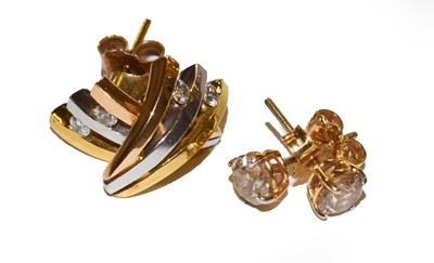 Lot 57 - A pair of diamond solitaire earrings; and a...