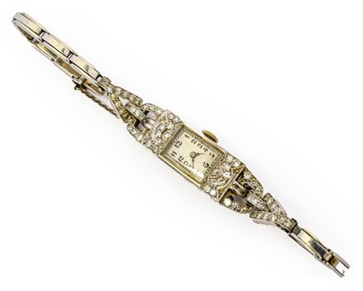 Lot 1006 - A lady's diamond cocktail wristwatch, circa...