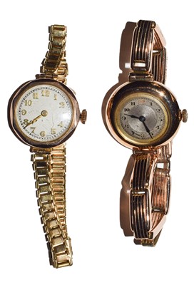 Lot 149 - A lady's 9-carat gold wristwatch with attached...