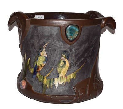 Lot 282 - An Arts & Crafts Bretby jardiniere, decorated...