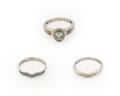 Lot 1028 - A 9 carat white gold aquamarine and diamond...