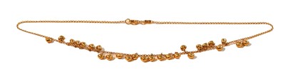Lot 1102 - A 9 carat gold necklace, the yellow trace link...