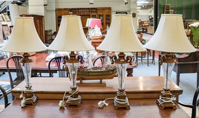 Lot 1276 - A set of four modern gilt composition and cut...