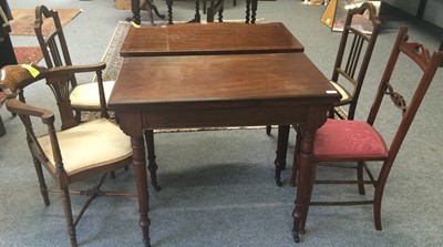 Lot 1106 - A mahogany foldover card table, a reproduction...