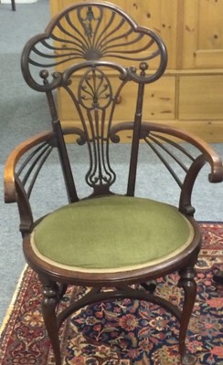 Lot 1113 - A 19th century mahogany three tier drop leaf...