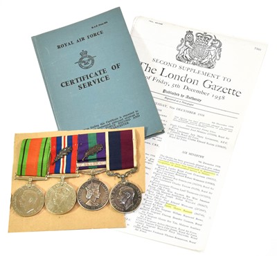 Lot 63 - A Second World War Long Service Group of Four...