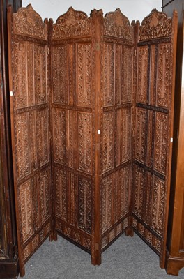 Lot 1411 - In Indian carved and pierced sandlewood four...