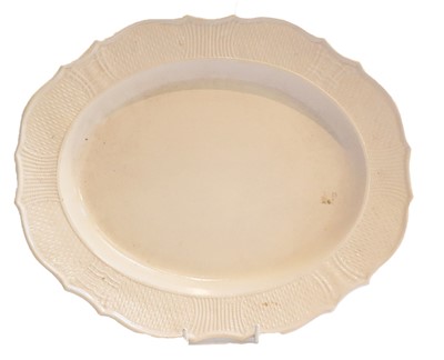 Lot 275 - An 18th-century salt glazed dish, together...