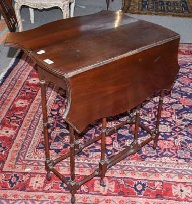 Lot 1331 - An Edwardian mahogany sutherland table, the...