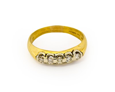 Lot 1123 - An 18 carat gold diamond five stone ring, the...