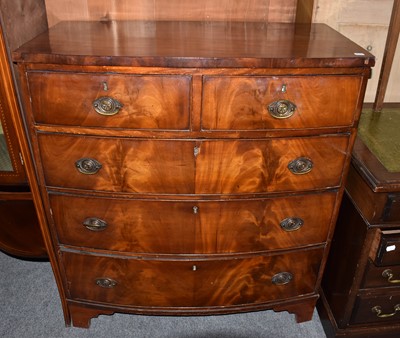 Lot 1316 - A George III mahogany bow fronted four height...