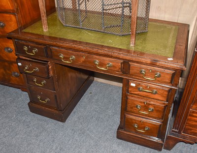 Lot 1314 - An early 20th-century green leather inset oak...