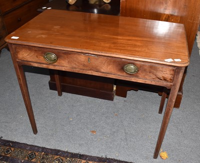 Lot 1332 - A George III mahogany side table of rounded...