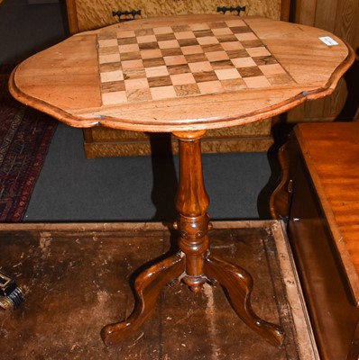 Lot 1330 - A Victorian walnut games table, circa 1870,...