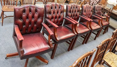 Lot 1355 - A set of four mahogany framed buttoned oxblood...