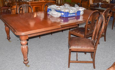 Lot 1273 - A Victorian mahogany dining table with three...