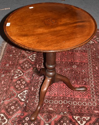 Lot 1340 - A George III mahogany snap top tripod table,...