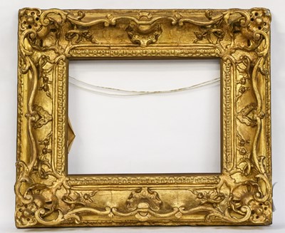 Lot 1427 - A 19th century carved wood and gesso frame,...