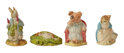 Lot 330 - Fourteen boxed Beatrix Potter figures; 12...