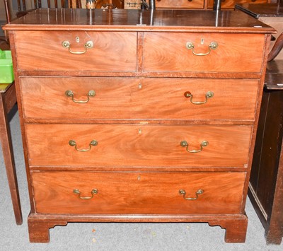 Lot 1342 - A George III mahogany, straight front four...