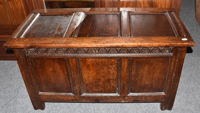 Lot 1286 - An early 19th-century three-panelled oak...